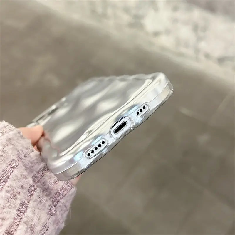 clear transparent iphone case with subtle quilted texture and silver metallic edges shown from the back side for wavy metallic iphone case electroplated protection