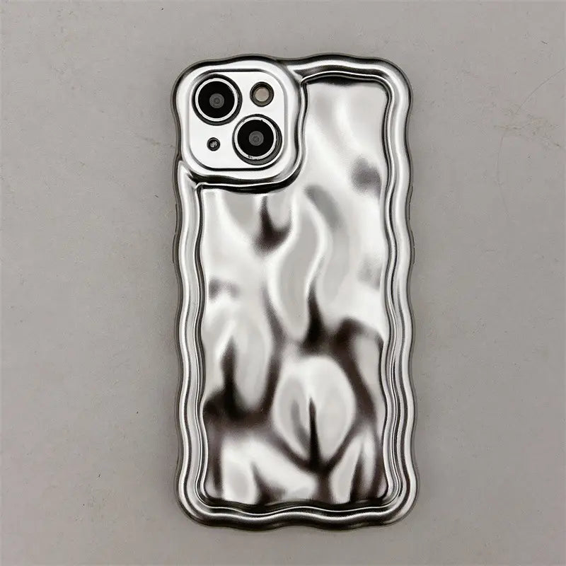 Silver wavy metallic iPhone case with electroplated protection featuring a textured surface and abstract leaf-like patterns shown from the back side.