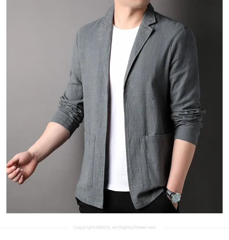 Men’s casual linen suit jacket in gray linen blend with a relaxed fit and two front pockets.