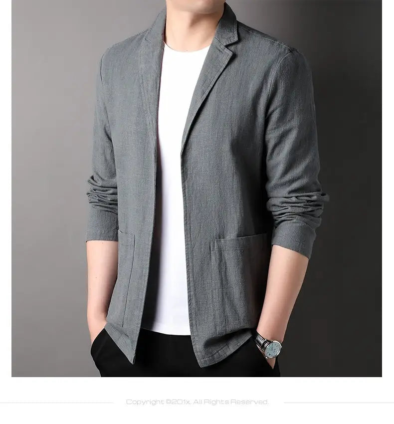Men’s casual linen suit jacket in gray linen blend with a relaxed fit and two front pockets.