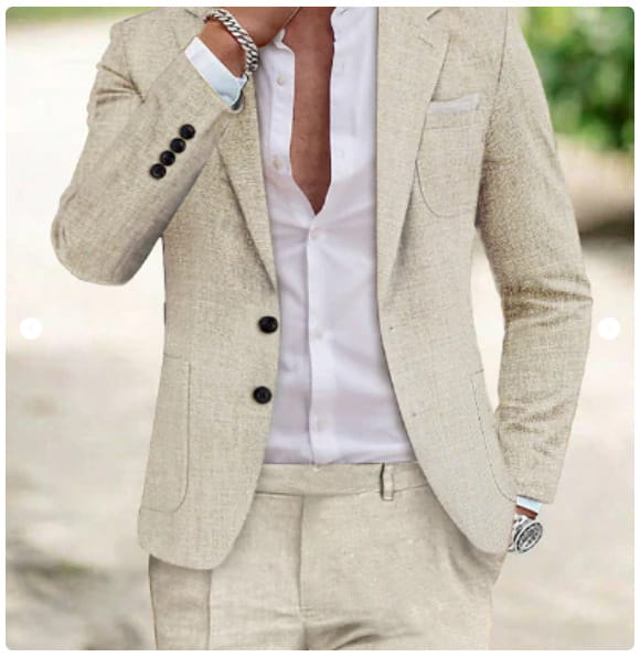 Men beige linen two piece suit featuring a textured blazer with black buttons and matching trousers.