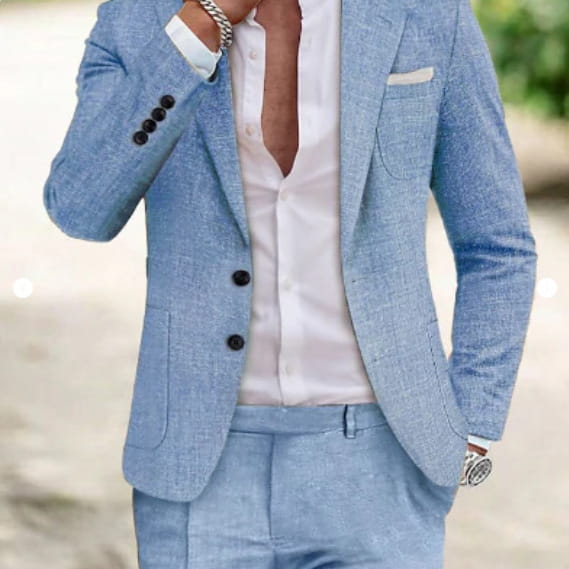 men beige linen two piece suit featuring a light blue textured blazer with black buttons and matching trousers