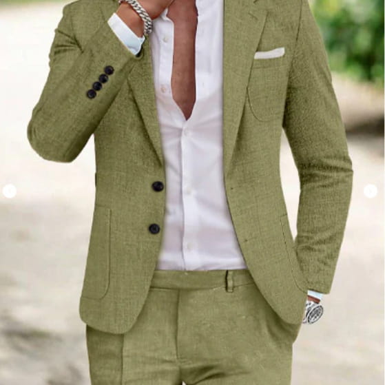 Men beige linen two piece suit featuring an olive green textured wool jacket with black buttons and a white pocket square.