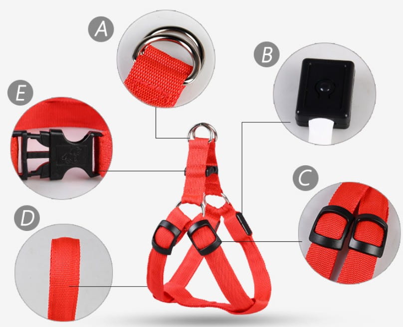 Led light up dog harness in red nylon with black plastic buckles and metal d-rings designed as a glowing reflective pet chest strap.