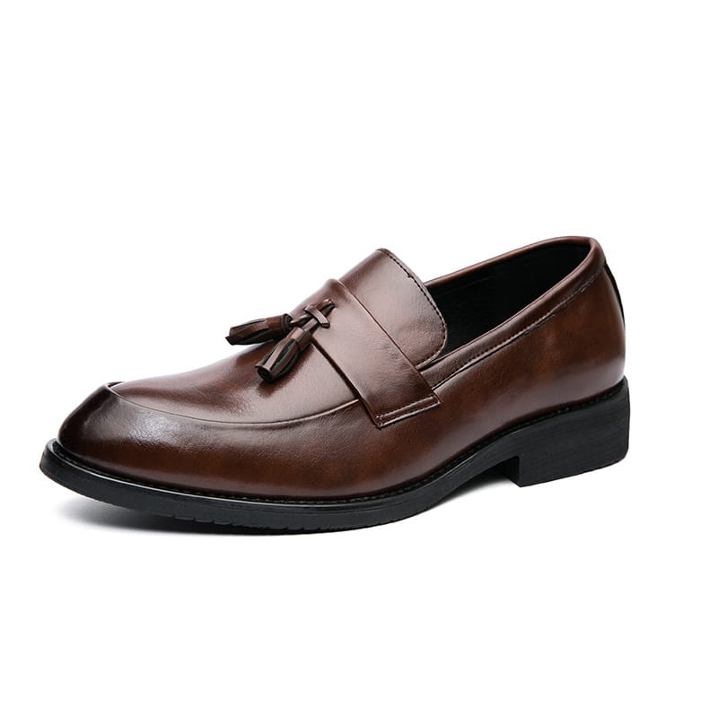 Men tassel loafers classic leather dress shoes in brown with polished finish and black rubber sole.