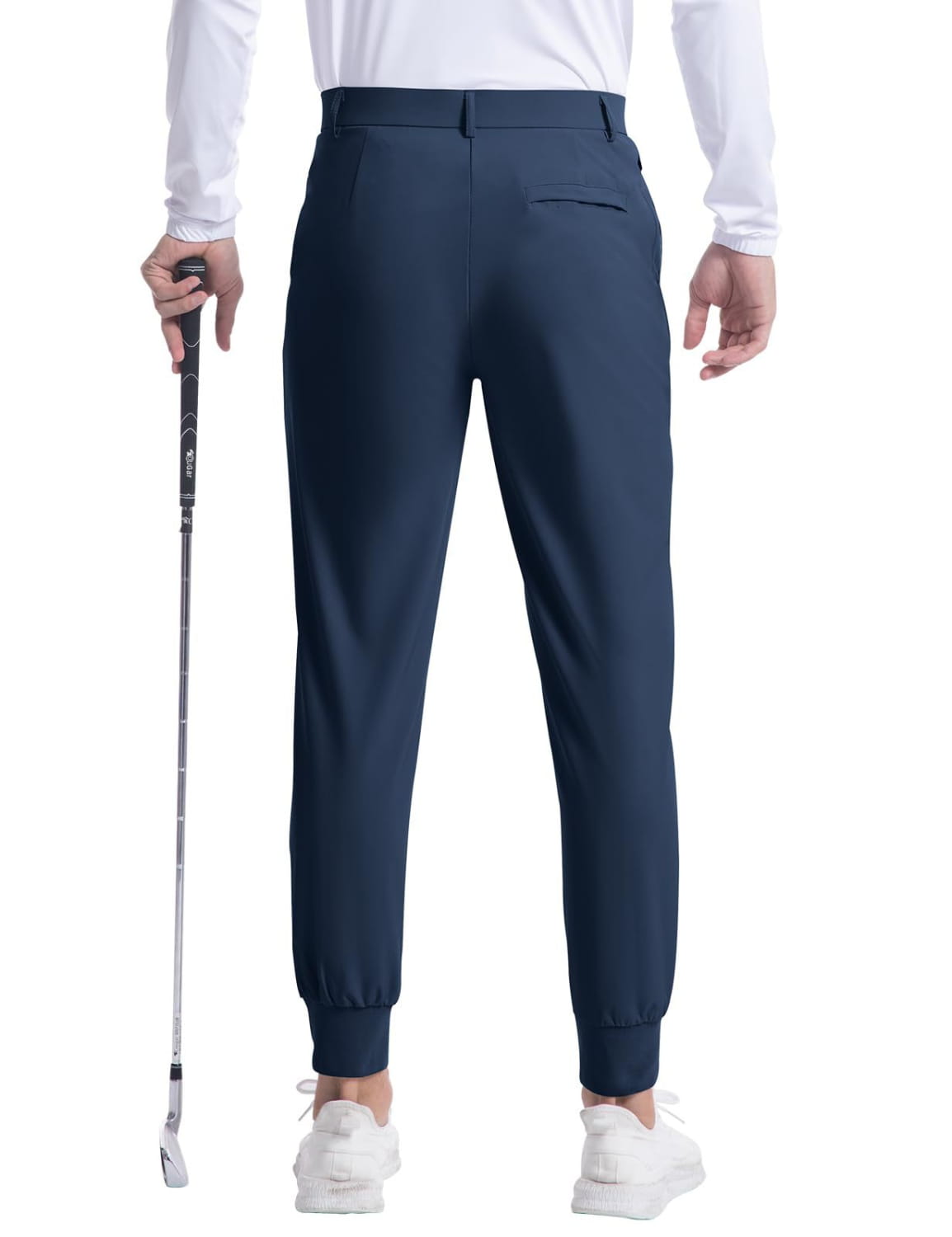 Men’s navy blue stretch golf jogger pants with elastic cuffs and a concealed back pocket shown from the back side.