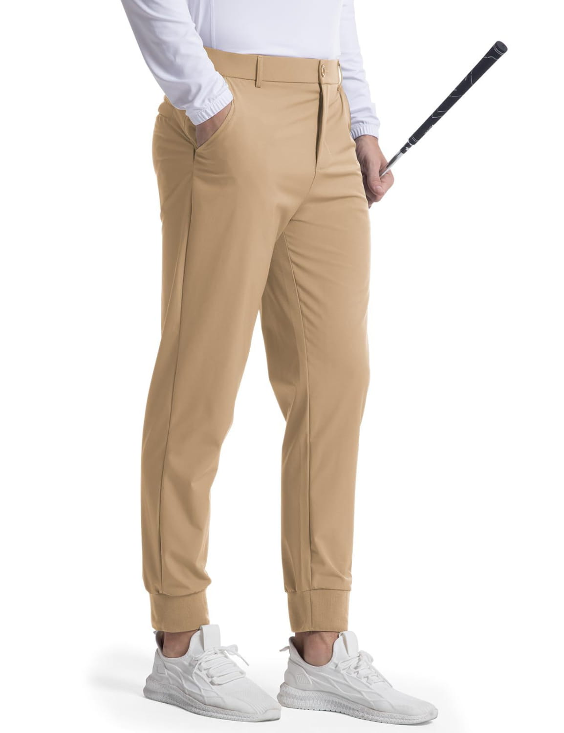 Men’s stretch golf jogger pants in beige featuring a slim tapered fit with elastic cuffs.