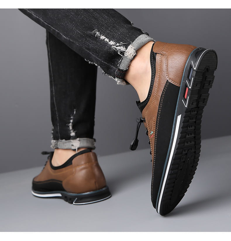 Chaussure de sport imperméable pour homme en cuir véritable marron et noir, avec une bande blanche le long de la semelle.