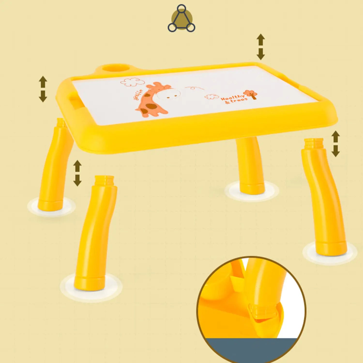 Bright yellow plastic led drawing projector table for kids with a white drawing surface featuring cartoon giraffe and tree illustrations for art painting.