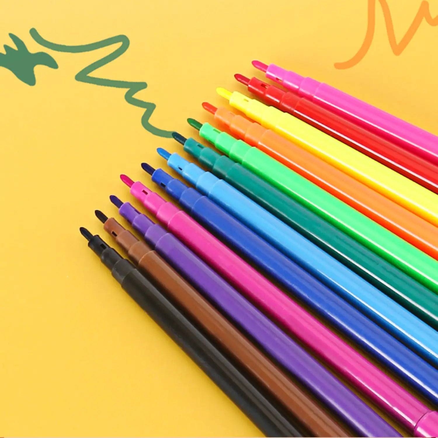 a set of colorful plastic-bodied fine tip markers arranged diagonally on a yellow surface for use with a led drawing projector table for kids art painting