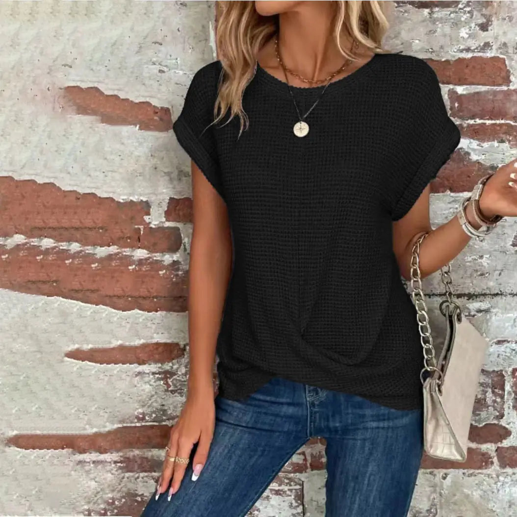 Black relaxed fit waffle knit short sleeve top with round neckline and front twist detail for women