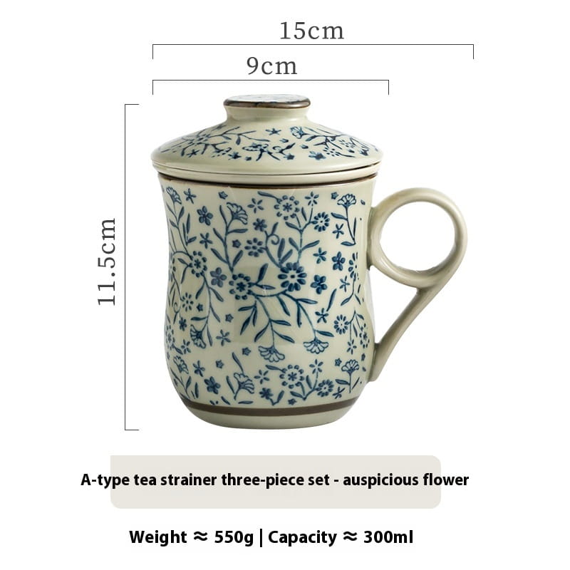 Cream-colored ceramic tea mug with blue auspicious flower pattern and matching lid featuring an infuser and 300ml capacity.