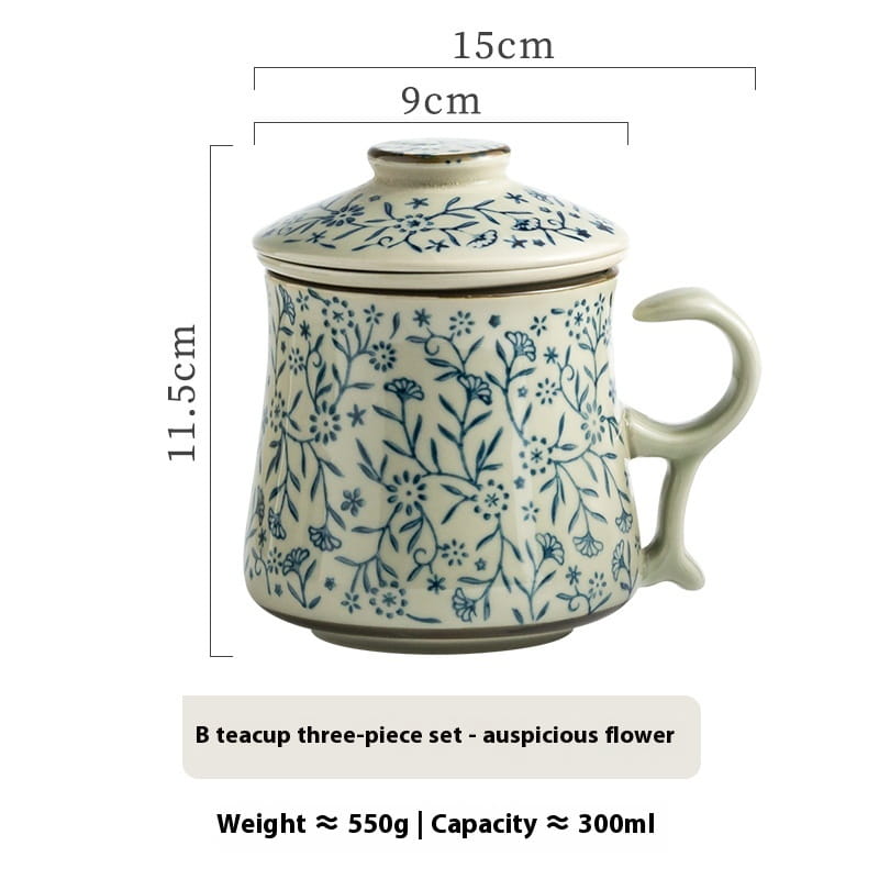 Cream-colored ceramic tea mug with blue auspicious flower pattern and matching lid featuring a 300ml infuser for brewing.