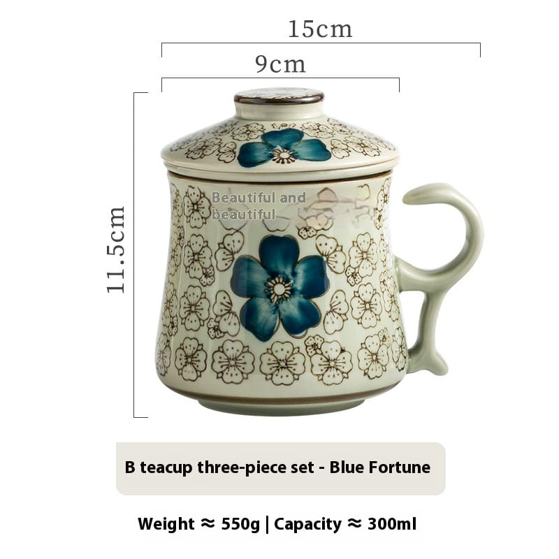 a ceramic tea mug with infuser and lid featuring intricate blue floral patterns on an off-white background and a gracefully curved handle, 300ml capacity