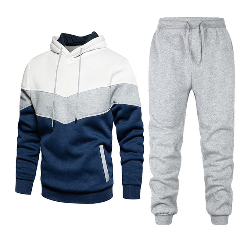 Herren-Color-Block-Hoodie- und Jogger-Set aus weichem Fleece mit Dreitonendesign: ein weißer Oberteilbereich, ein grauer Mittelbereich sowie marineblaue Ärmel- und Unterteilbereiche.