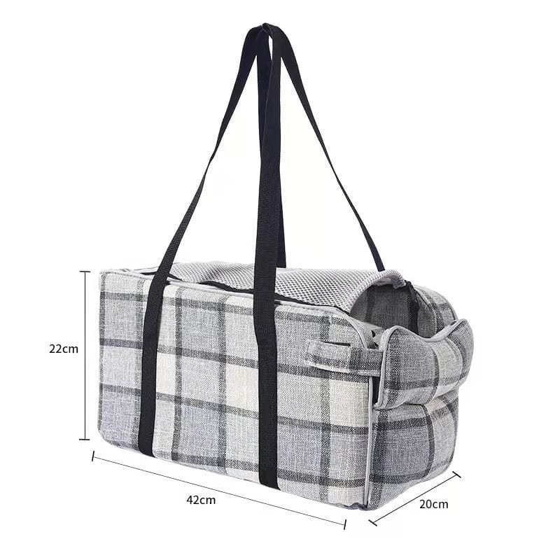 Gray and white plaid breathable pet carrier bag with black fabric handles for travel use