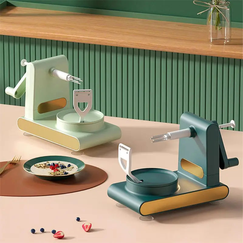 Two multifunctional apple peeler and slicer tool kits in pastel mint green and teal with beige bases and metallic blade assemblies for efficient fruit peeling and slicing.