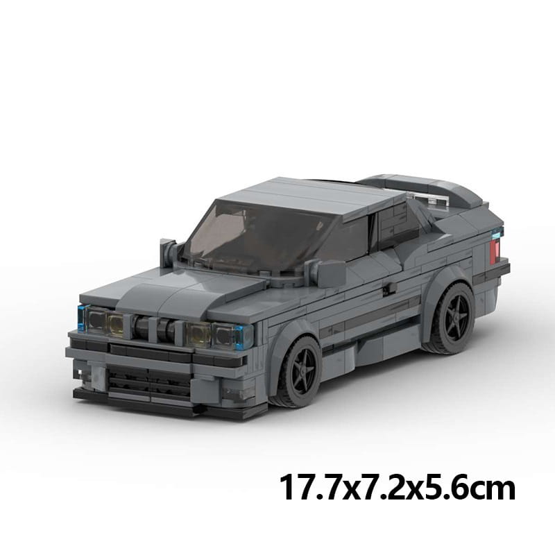 Modèle Lego Technic gris d’une voiture de sport modifiée, avec roues noires et phares bleutés, composé de 509 briques pour le modèle de voiture de sport E36, jouet.