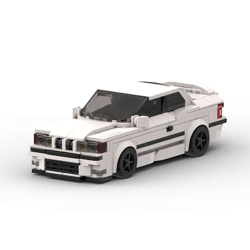 Modèle de voiture de sport BMW E36 M3 construit en Lego blanc, avec roues noires et bandes de course provenant du modèle de voiture de sport E36, ensemble jouet de 509 pièces.