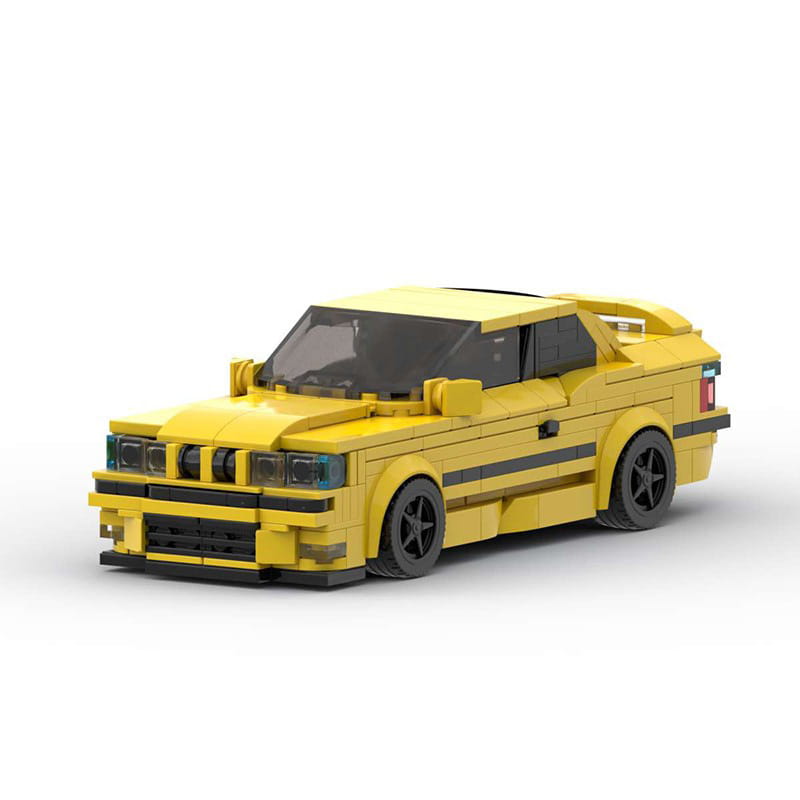 Modèle de voiture de sport BMW E36 M3 construit en Lego jaune éclatant, avec accents noirs et roues détaillées, provenant du modèle de voiture en briques E36, jouet de 509 pièces.