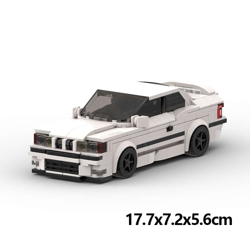 Modèle de voiture de sport BMW E36 M3 construit en Lego blanc, avec bandes de course noires et roues détaillées, provenant du modèle de voiture de sport en briques E36, ensemble jouet de 509 pièces.