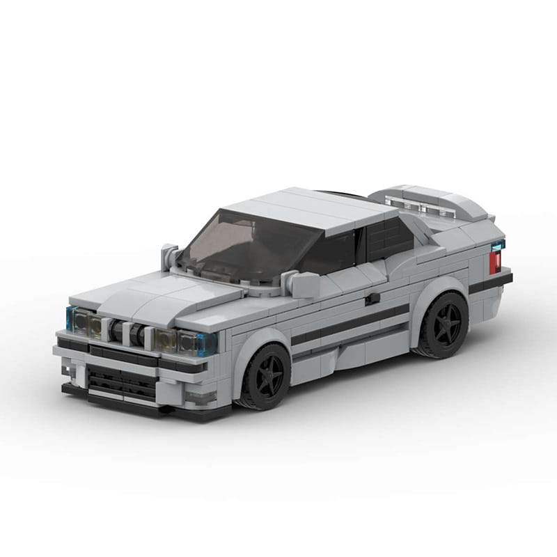 Modèle de voiture de sport BMW E36 M3 construit en Lego gris, avec roues noires et bandes de course, assemblé à partir de briques de construction de 509 pièces, jouet.