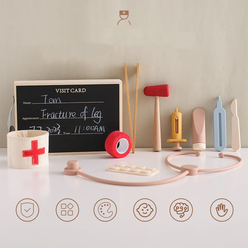 Estetoscopio de silicona color rosa con auriculares suaves y redondeados, así como tubo flexible, del set de juguete médico infantil de doctor de madera y silicona.