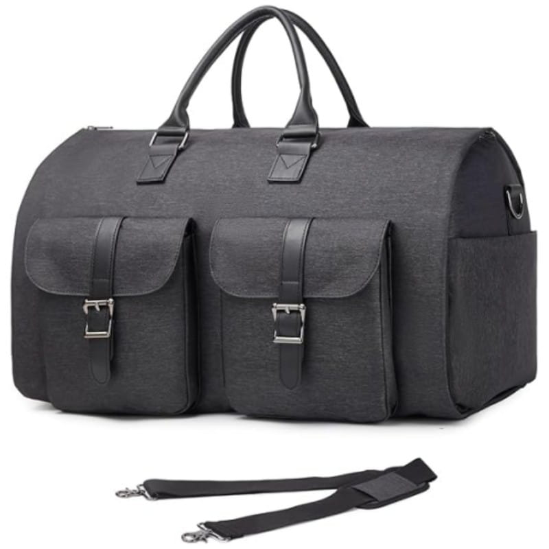 Black canvas duffel bag with leather accents and silver buckles designed as a multifunctional folding travel bag.