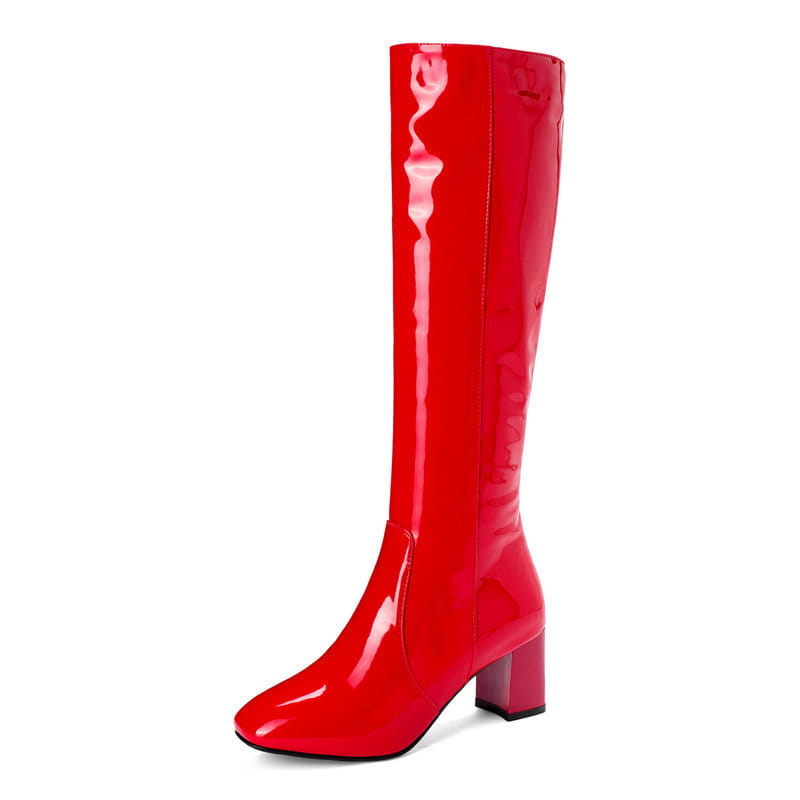 Vibrant red patent leather knee high boots with a square toe and block heel.