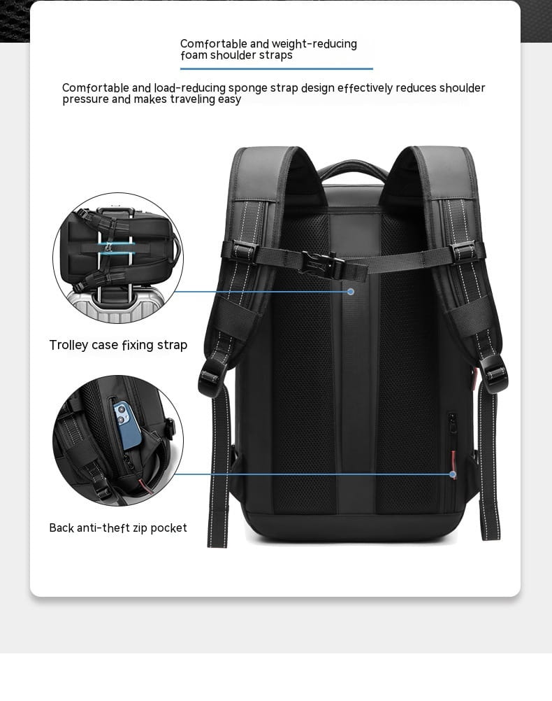 Black travel backpack with foam shoulder straps and back anti-theft zip pocket designed for vacuum compression and business laptop use shown from the back side.
