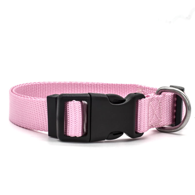 Pink woven nylon dog collar with adjustable strap featuring a black plastic buckle and silver metal d-ring for pet neck safety.