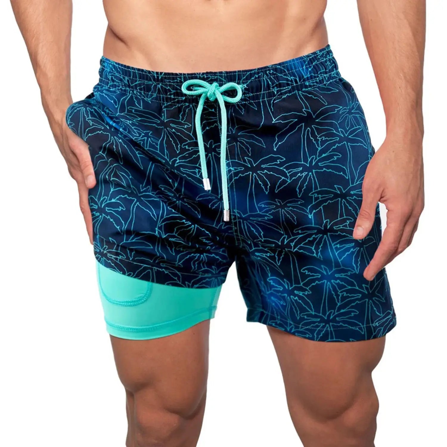 Men’s navy blue swim trunks with light teal tropical palm tree pattern, matching drawstring, and inner turquoise lining, suitable for summer beachwear.