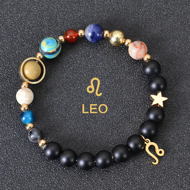celestial zodiac planet matte stone beaded bracelet featuring black matte beads colorful patterned stones resembling planets and gold-toned leo symbol and star charms