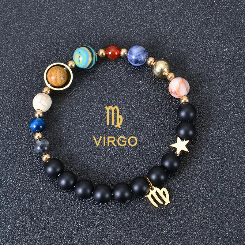 A black beaded bracelet featuring colorful gemstone beads and gold-toned zodiac charms including a Virgo symbol from the Celestial Zodiac Planet Matte Stone Beaded Bracelet collection.