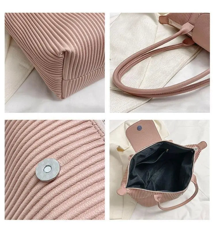 A soft pink ribbed pu leather pleated shoulder tote bag with magnetic snap closure and black interior lining.