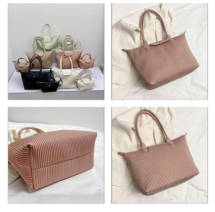 Beige ribbed pleated shoulder bag made of minimalist pu leather with matching handles tote style.