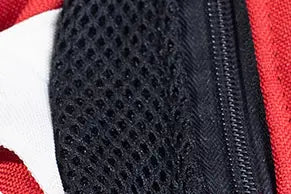 black mesh fabric with a zipper along the edge on the back side of a pet carrier backpack dog front pack denim vest