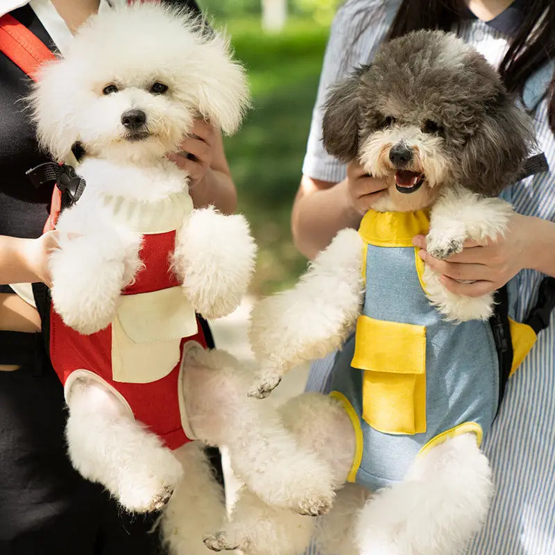 Red and beige pet carrier backpack dog front pack with yellow accents made of denim vest material for comfortable pet transport.
