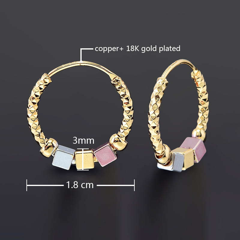 Gold-plated copper hoop earrings with a textured braided design and colorful pastel blue pink and gold square beads featuring two tone rose motif and pink enamel accents.