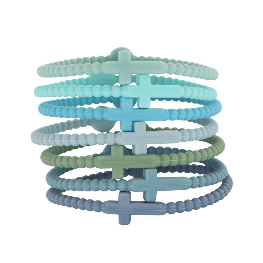 A set of six pastel-colored beaded silicone cross bracelets with round clasps featuring central cross charms in matching tones.