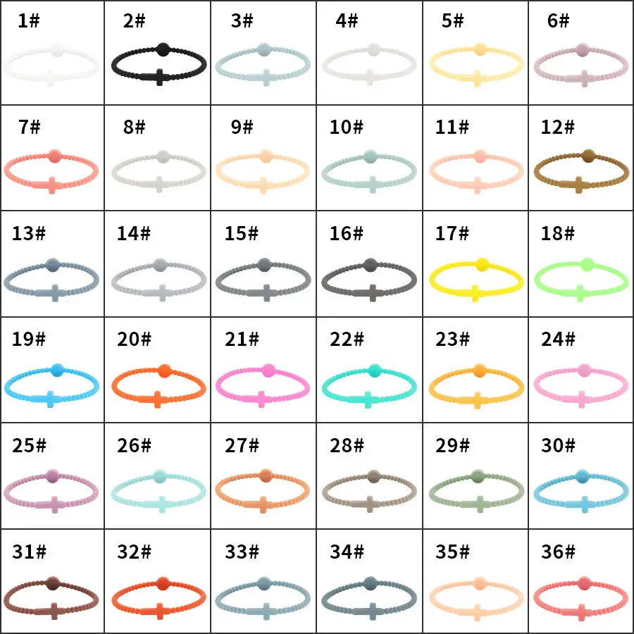 A collection of 36 beaded silicone cross bracelets with round clasps in assorted pastel and solid colors, each featuring a simple cross design with a small spherical accent.