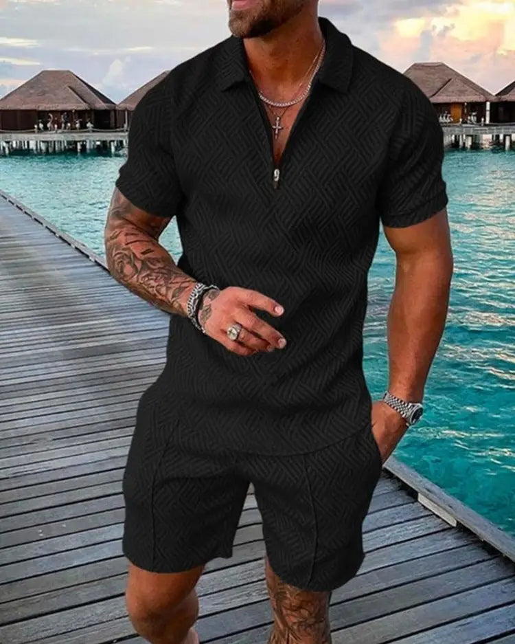 Men’s black textured short-sleeved polo shirt with subtle herringbone pattern and zipper collar detail from the textured polo and shorts coordinated summer set.