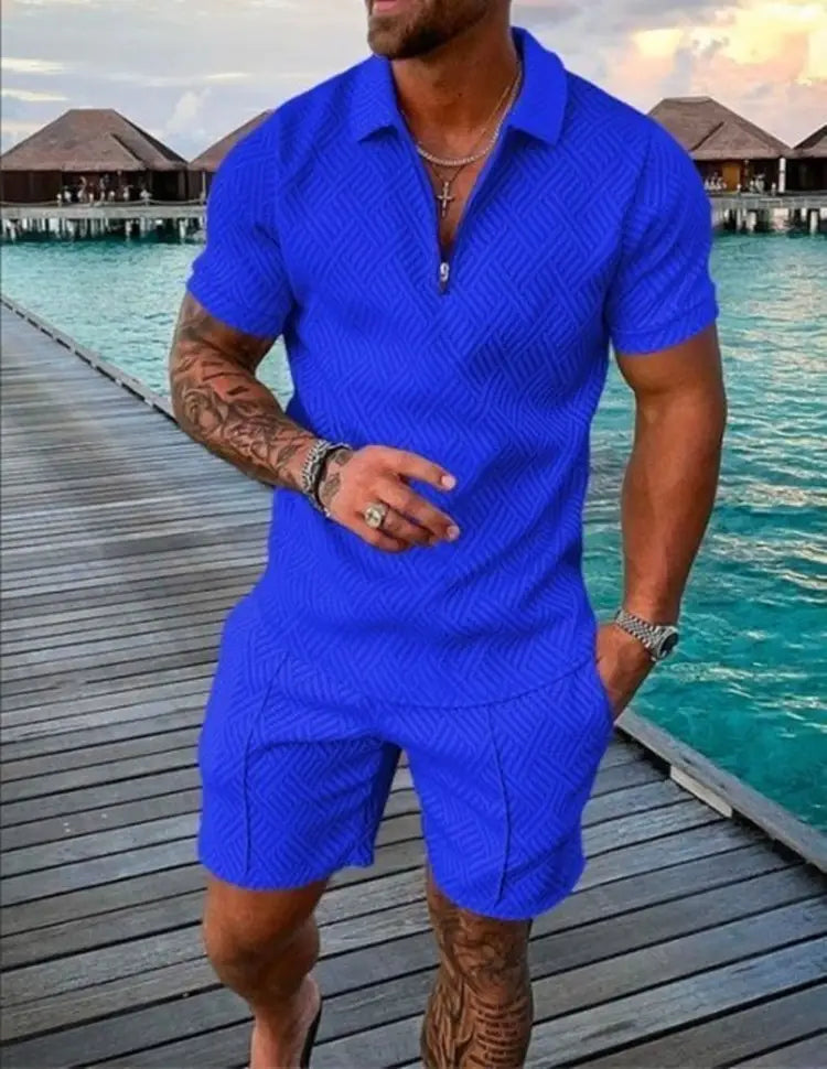 Men’s textured royal blue short-sleeved polo shirt with matching shorts set designed for summer wear.