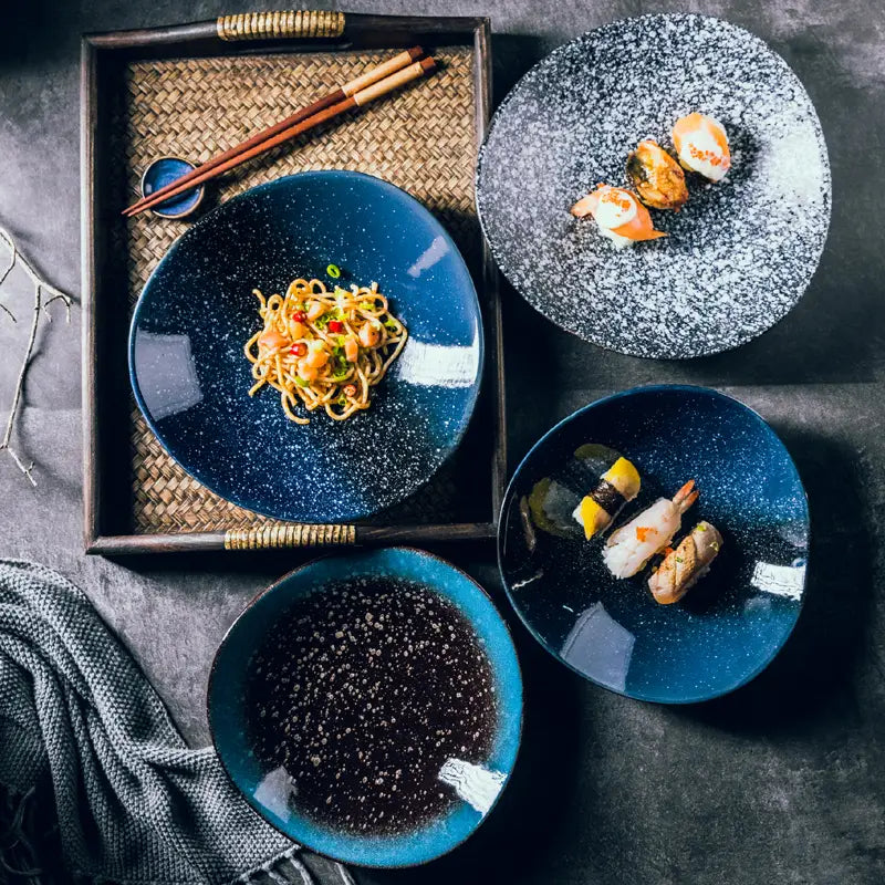 Ceramic blue speckled Nordic round corner fillet plate with deep blue ceramic material and white brushstroke accents.