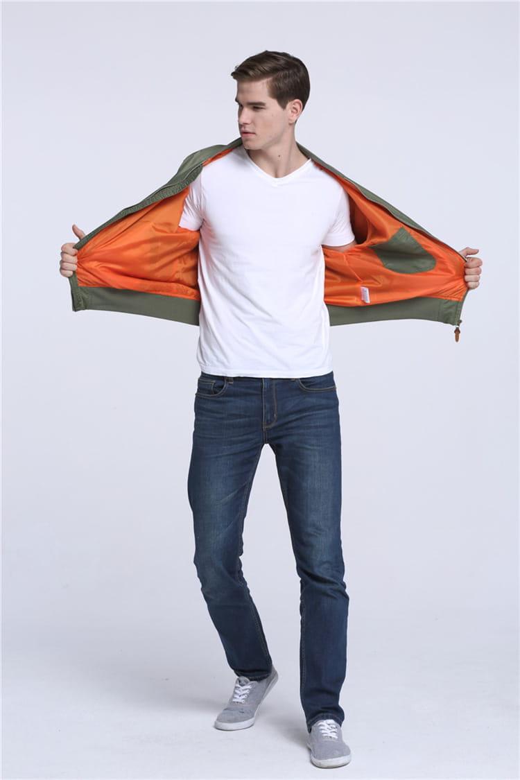 ma1 pilot bomber jacket with olive green exterior and orange camouflage-lined interior designed for casual wear with a stand collar