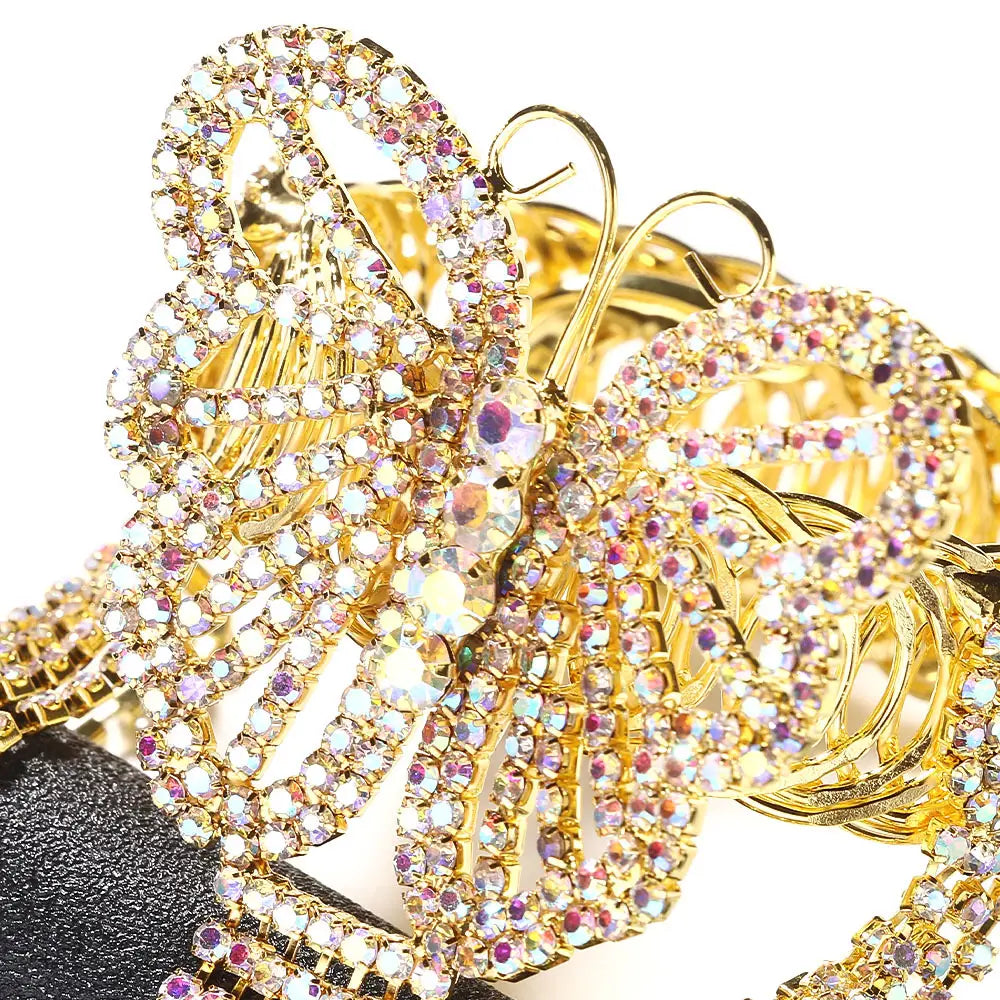 gold butterfly-shaped arm chain bracelet adorned with sparkling clear and iridescent rhinestones featuring a tassel design
