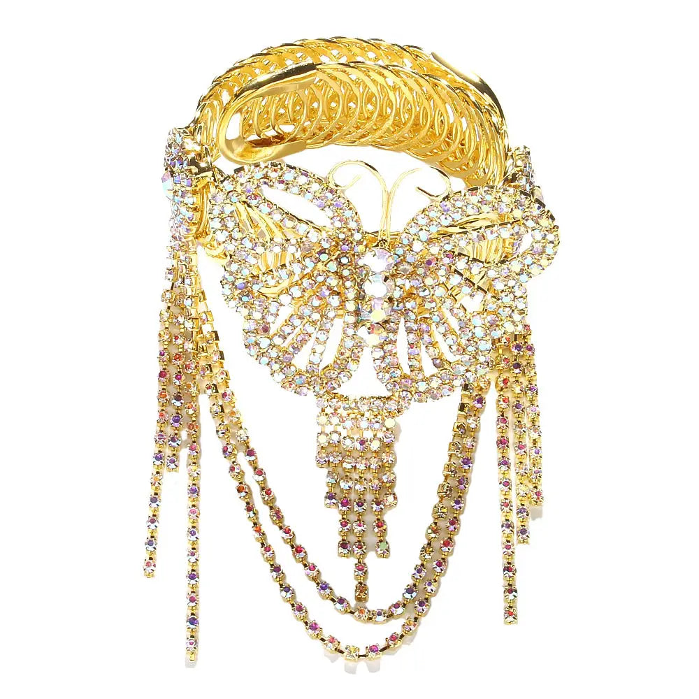 Gold-toned butterfly-shaped fairy butterfly rhinestone tassel arm chain bracelet adorned with clear and pink crystals and cascading layered chains.