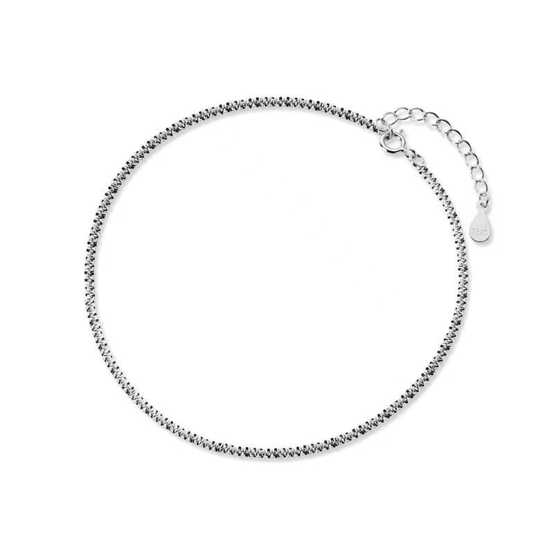 Silver-toned 925 silver adjustable anklet with a textured twisted chain design and a small teardrop-shaped tag from the sparkling crystal bracelet and anklet set.