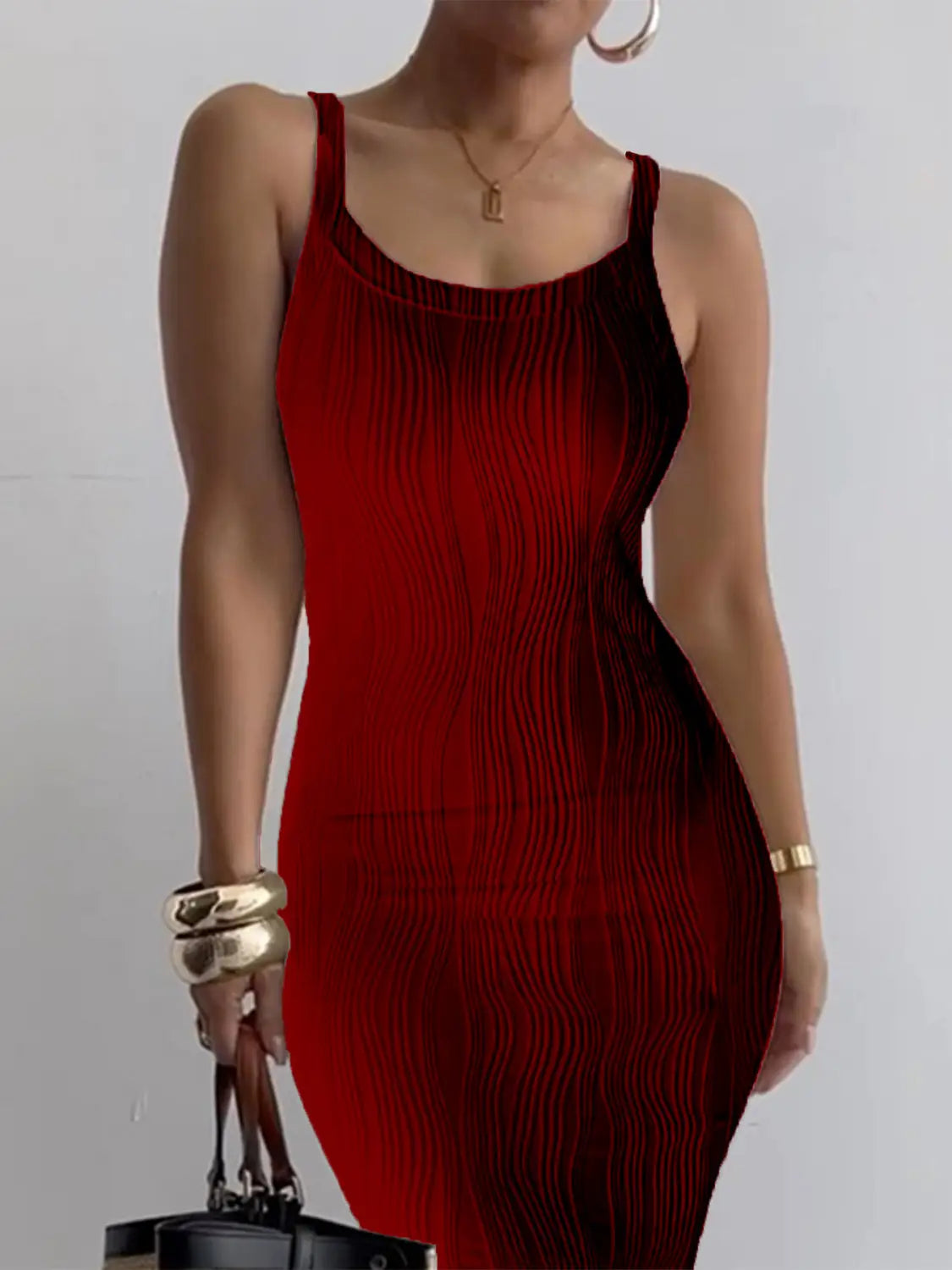 A form-fitting deep red ribbed knit square neck sleeveless midi dress with thin straps and a flattering silhouette.