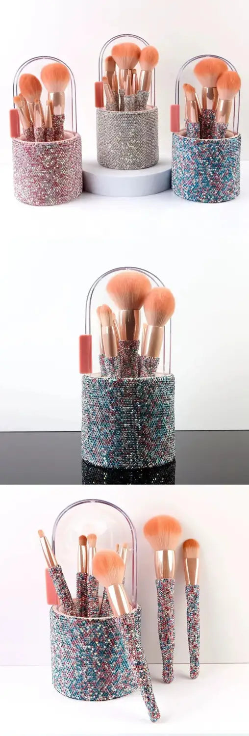 Diamond makeup brush set with a sparkly multicolored glitter brush holder featuring rose gold handles and matching rhinestone brushes.